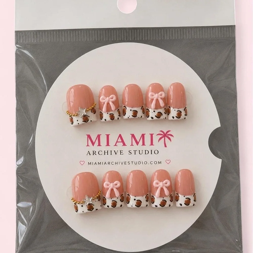 Handmade press ons with French tip cow print